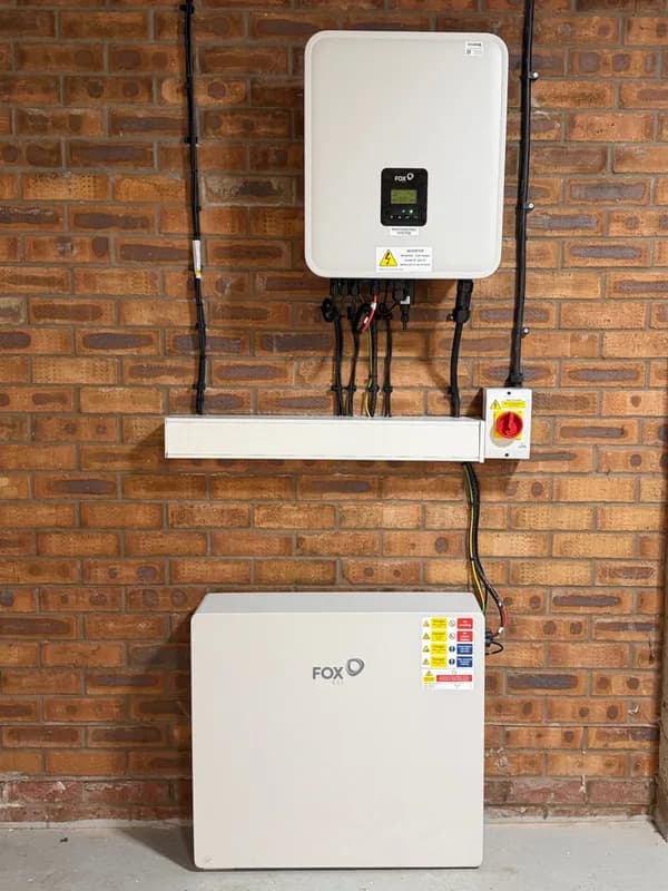 Fox ESS battery and inverter on an internal brick wall