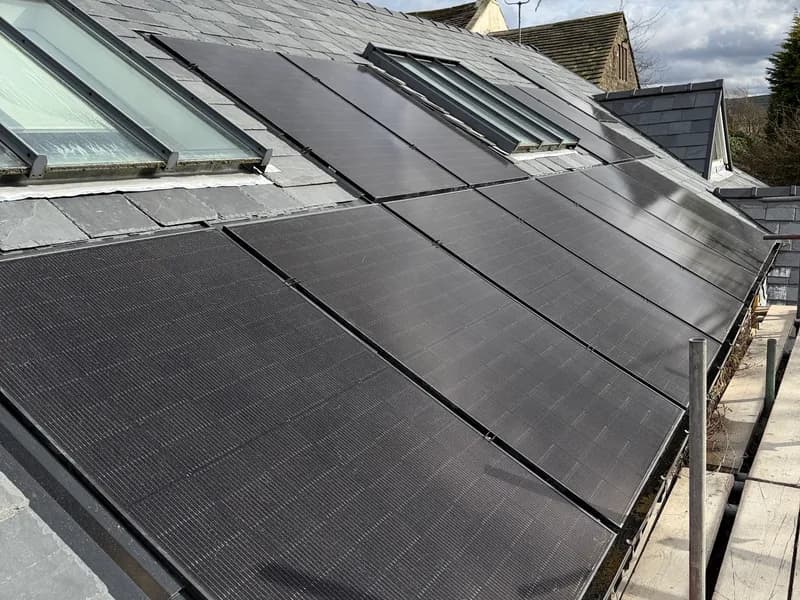 All-black solar panels installed across a slate roof in West Yorkshire